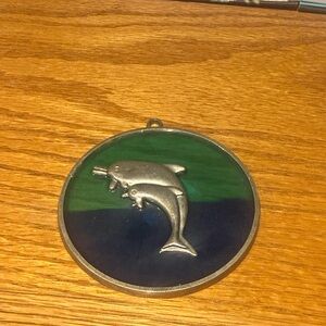 Dolphin sun catcher with Green and Blue Background